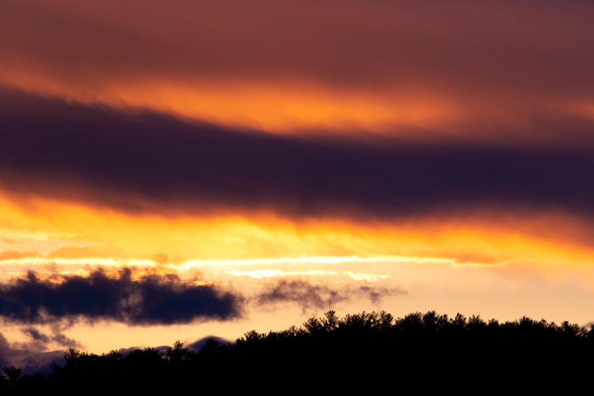 Soft evening atmosphere with layered dusk tones and a calm night sky
